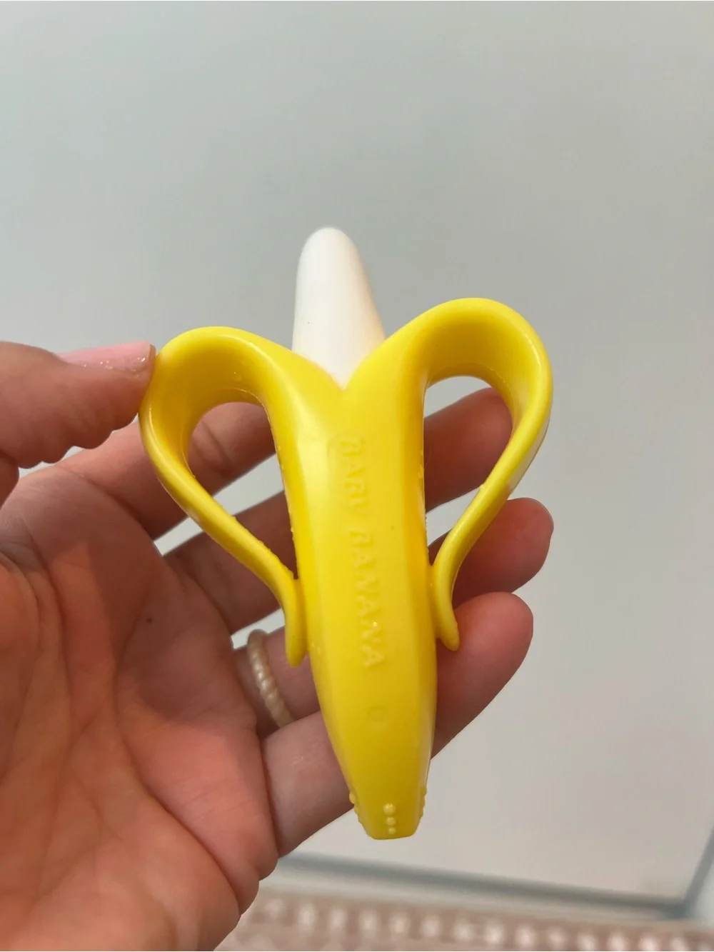 Nuby teething ring, necklace, Yellow Banana Silicone Finger Toothbrush for Kids